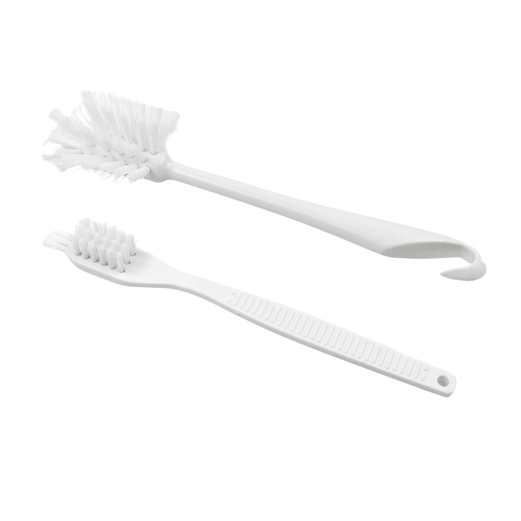 Cleaning brush with ergonomic handle on plain background