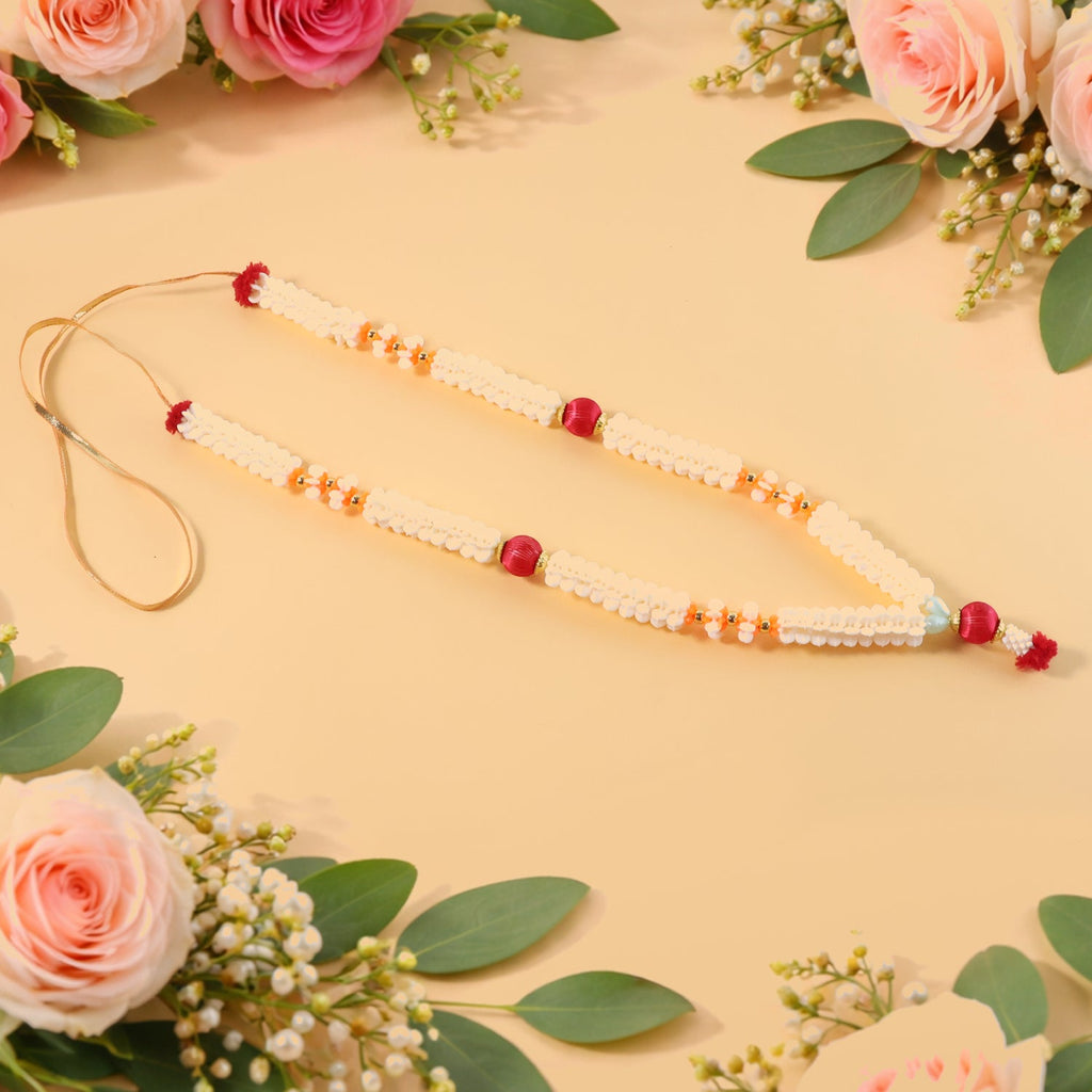 Traditional pooja gajra garland with floral beads for religious decoration