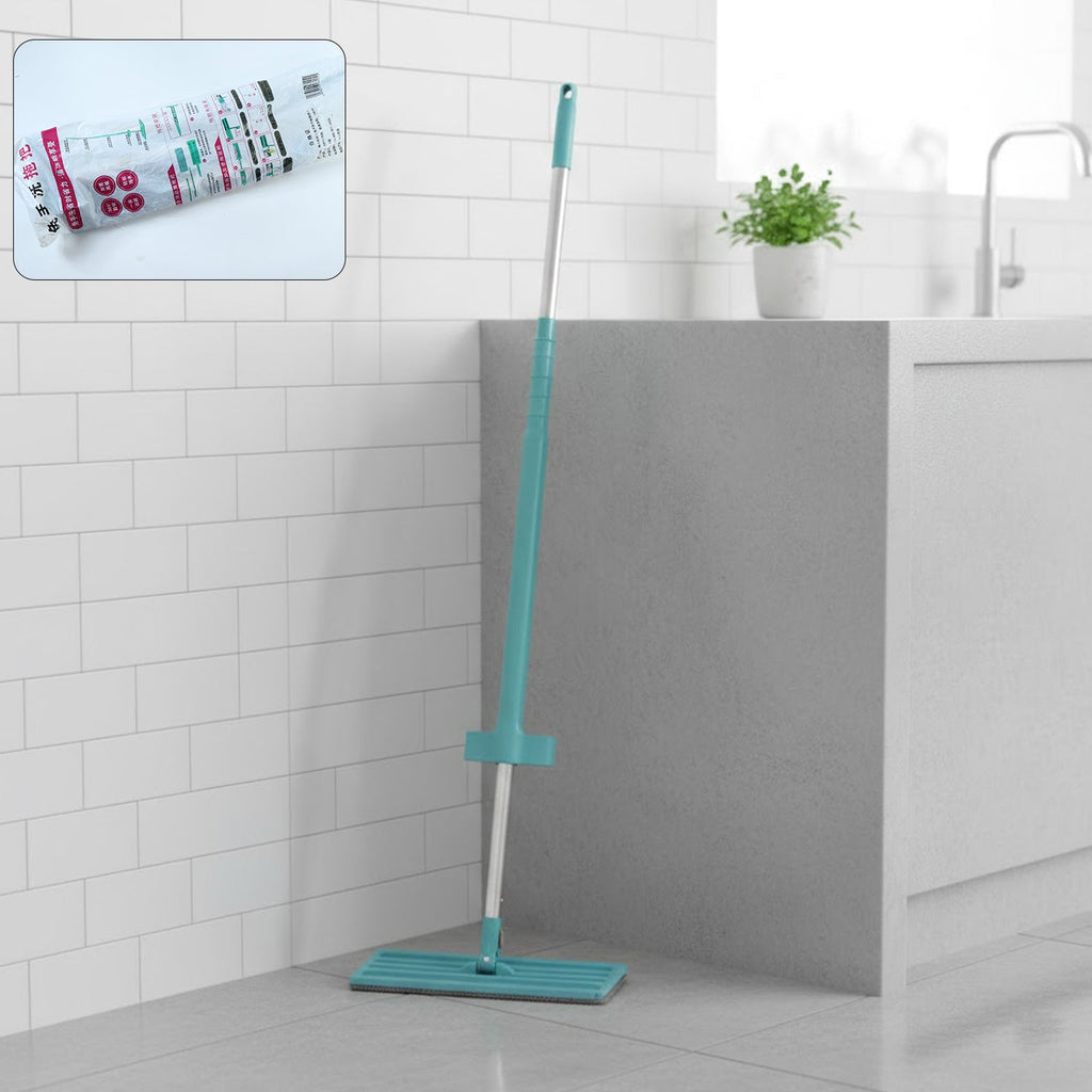 Flat floor cleaning mop with long handle and rectangular mop head on floor