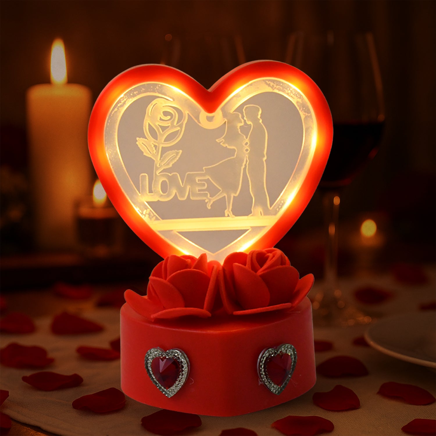 Love Couple Showpiece featuring heart-shaped frame with red rose base