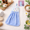 Soft microfiber hanging hand towel with self-adhesive wall hook neatly displayed