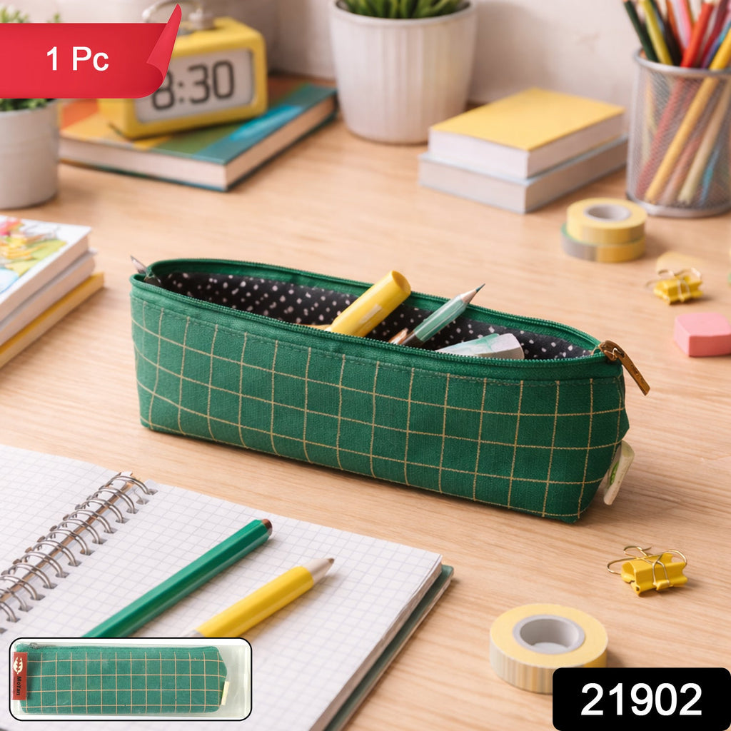 Open green grid pencil pouch showing spacious interior for stationery.