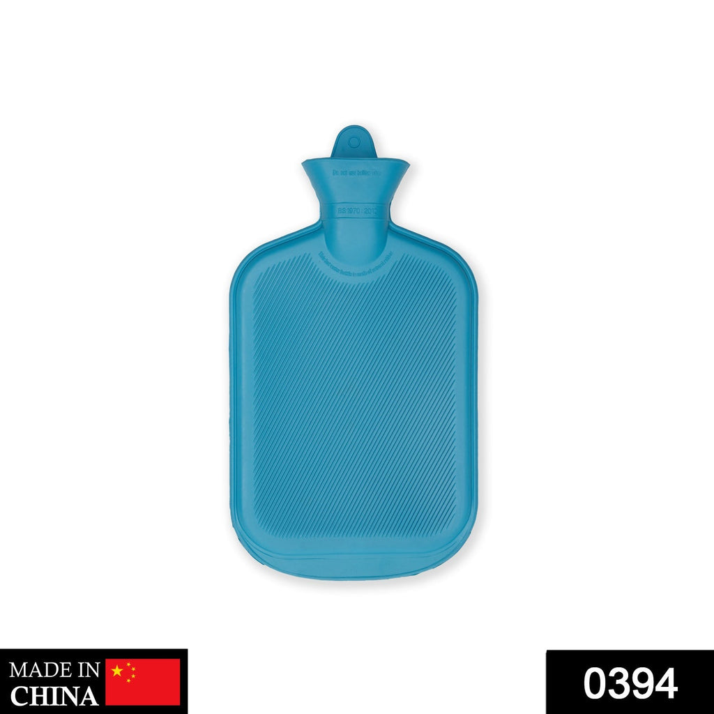 Green rubber hot water bag for muscular pain relief