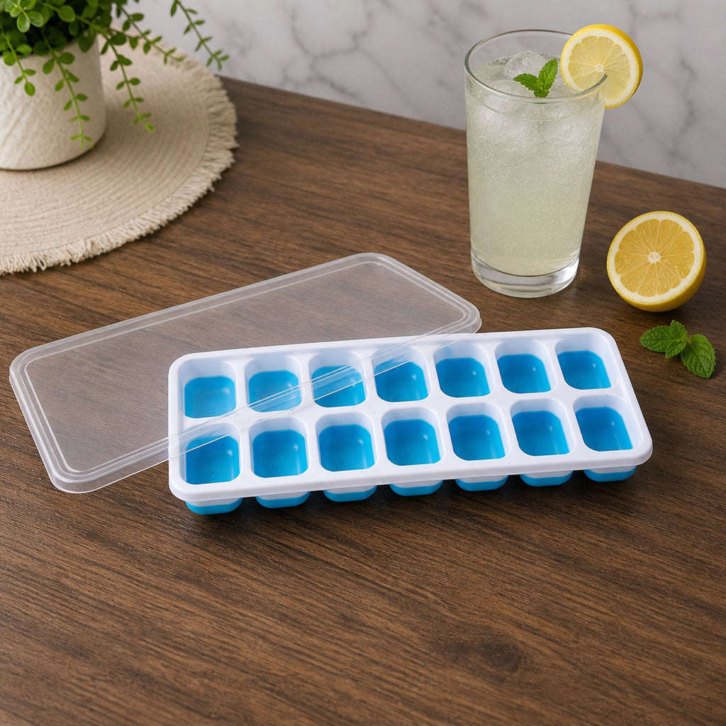 Ice cube tray filled with water on kitchen surface