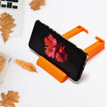 Plastic business card and mobile holder stand on desk