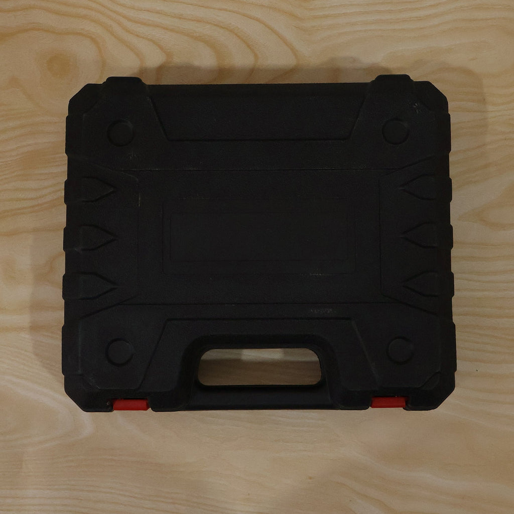 Cordless drill tool kit case on wood surface