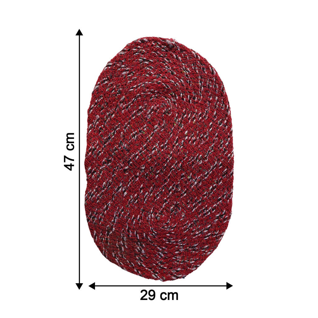 Close-up of red floor mat showing textured fabric