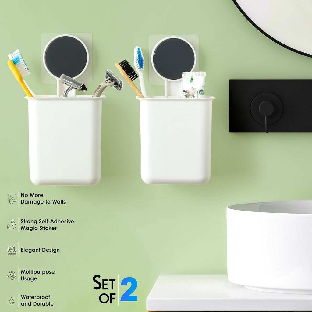 Drill-free adhesive bathroom organizer cups installed on a wall