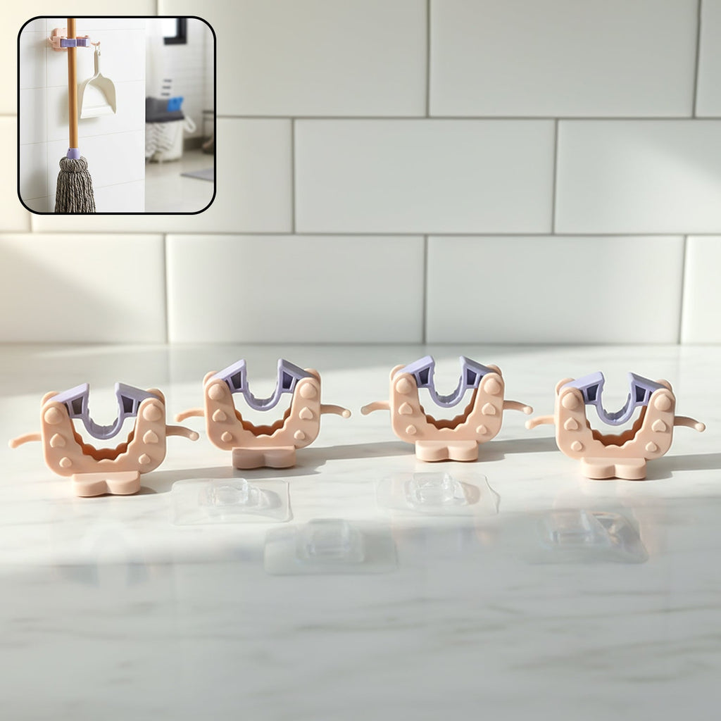 Close-up view of wall mounted broom and mop holder clip