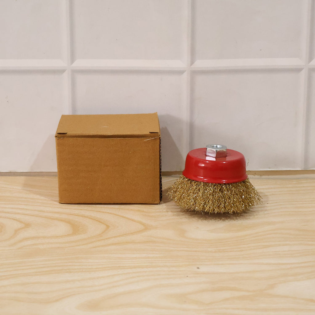 Copper-colored cup wire brush for workshop use