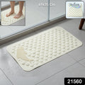 Anti-slip bath mat with suction cups installed in bathroom shower for safety