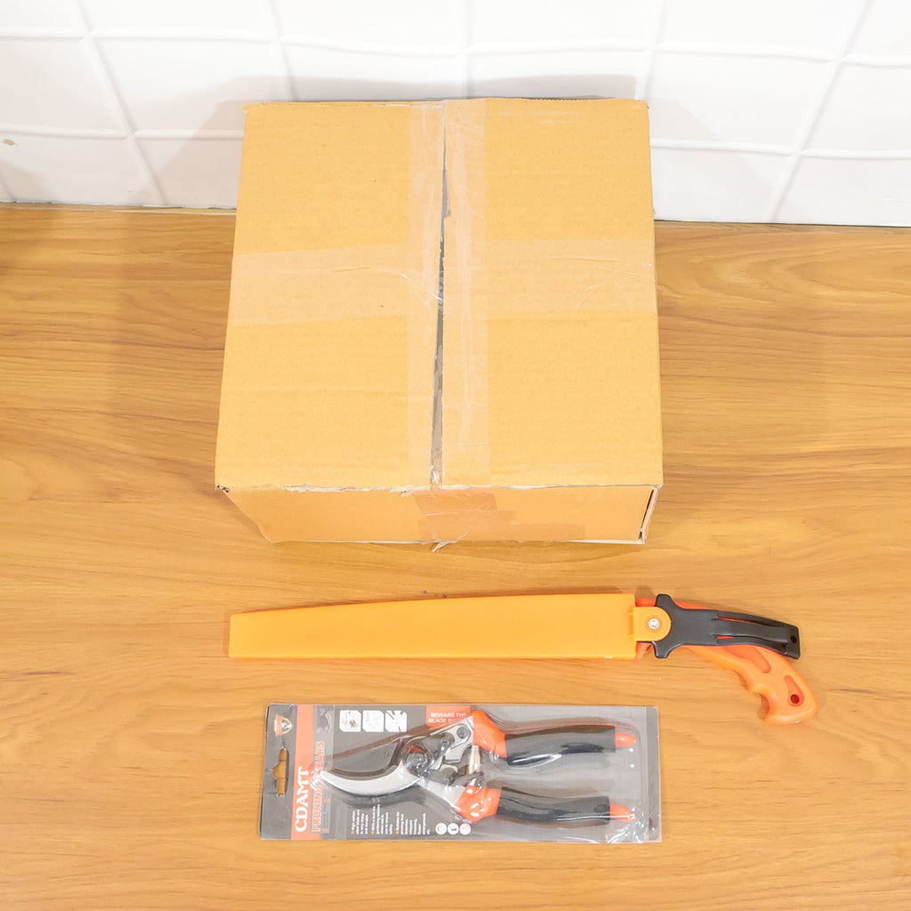 Heavy duty pruning shears and hand saw for effective garden care