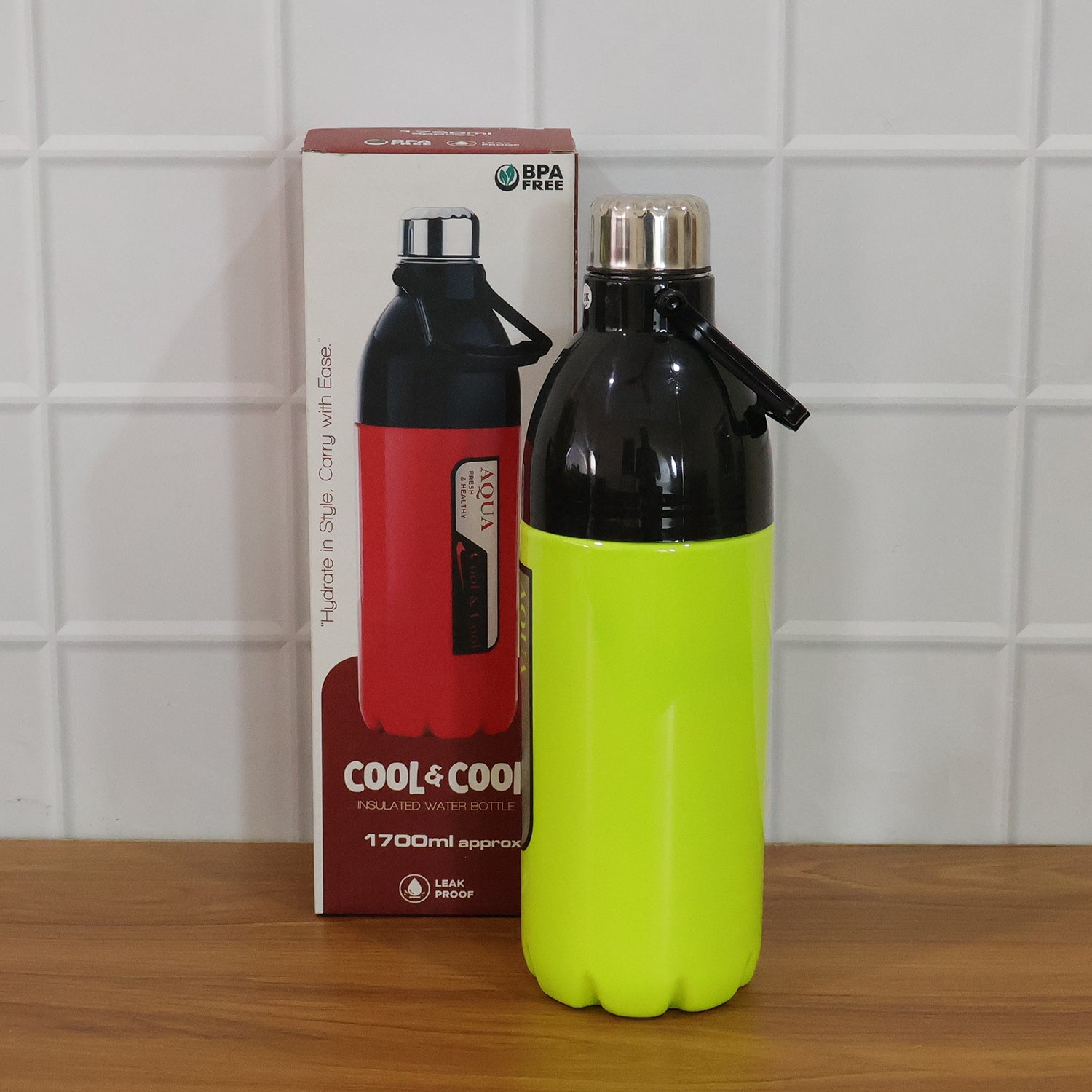 Side view of the portable water bottle featuring a comfortable carry strap for convenience.