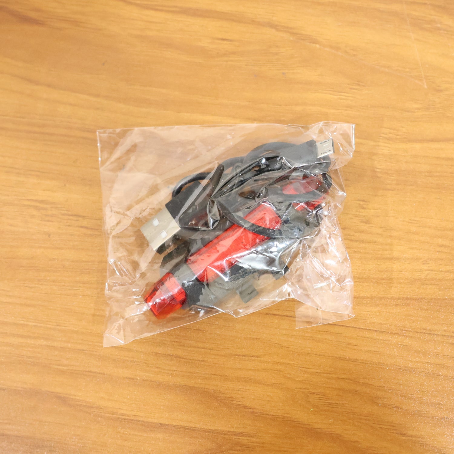 LED bicycle tail light flashing while riding at night for high visibility