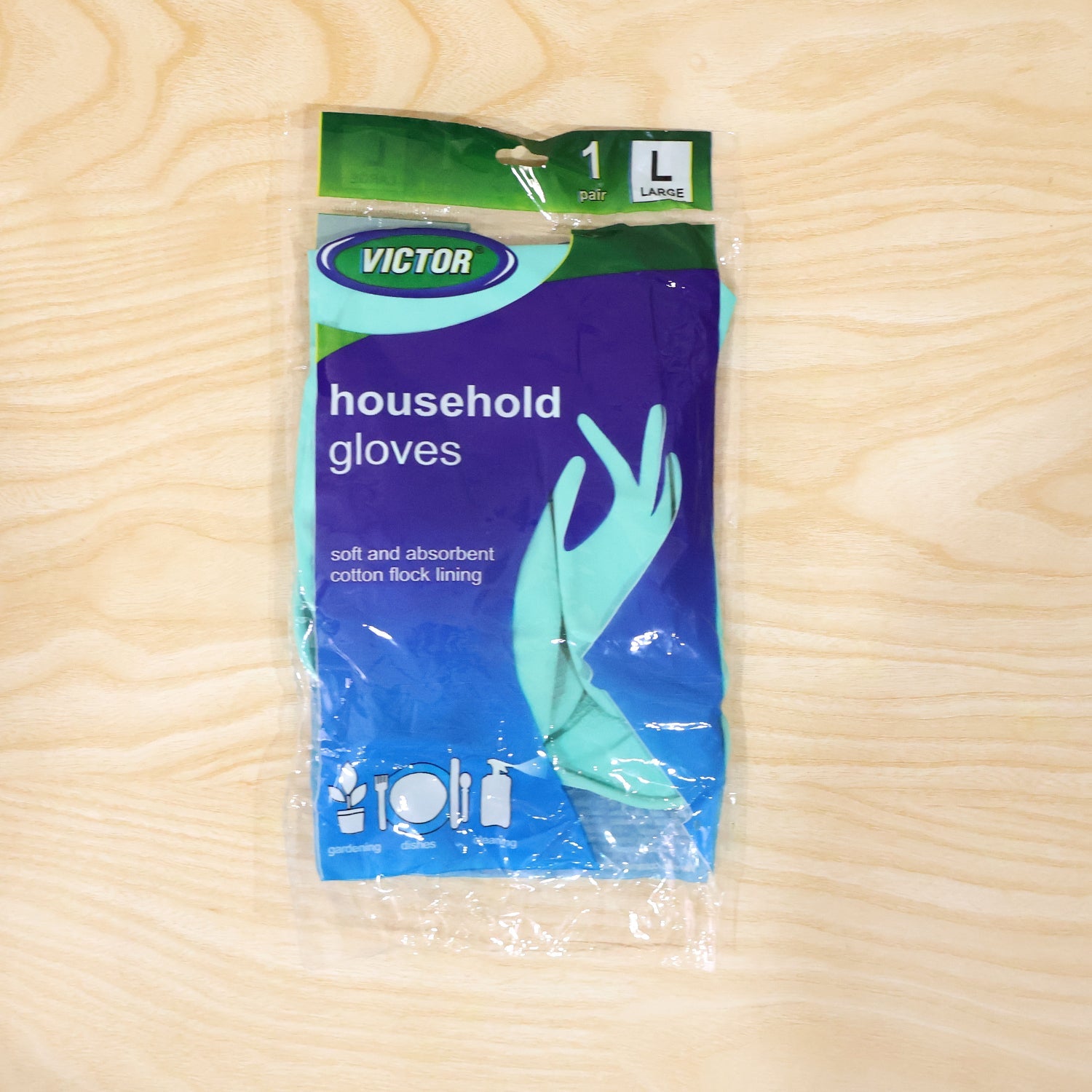Reusable green rubber gloves in use