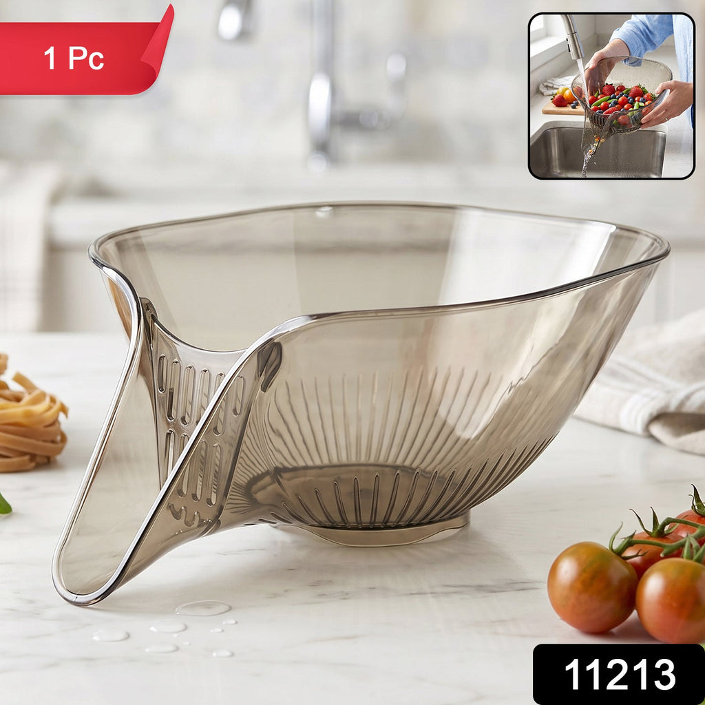 Clear multipurpose fruit vegetable strainer with built-in drain.