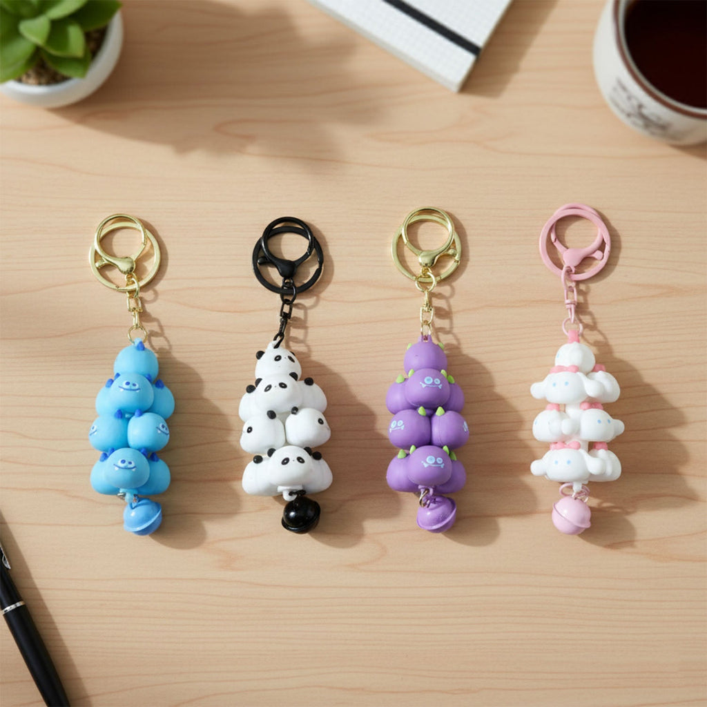 Cute decorative keychain charm showcasing a charming cloud and bell design.
