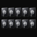 Transparent adhesive wall hooks 10pc set on white background