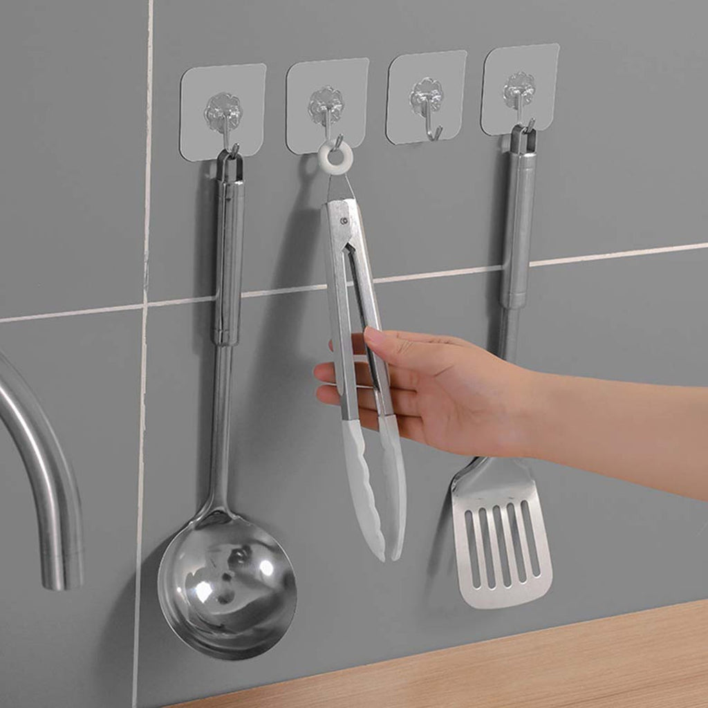 Wall hooks being used to hang items in home