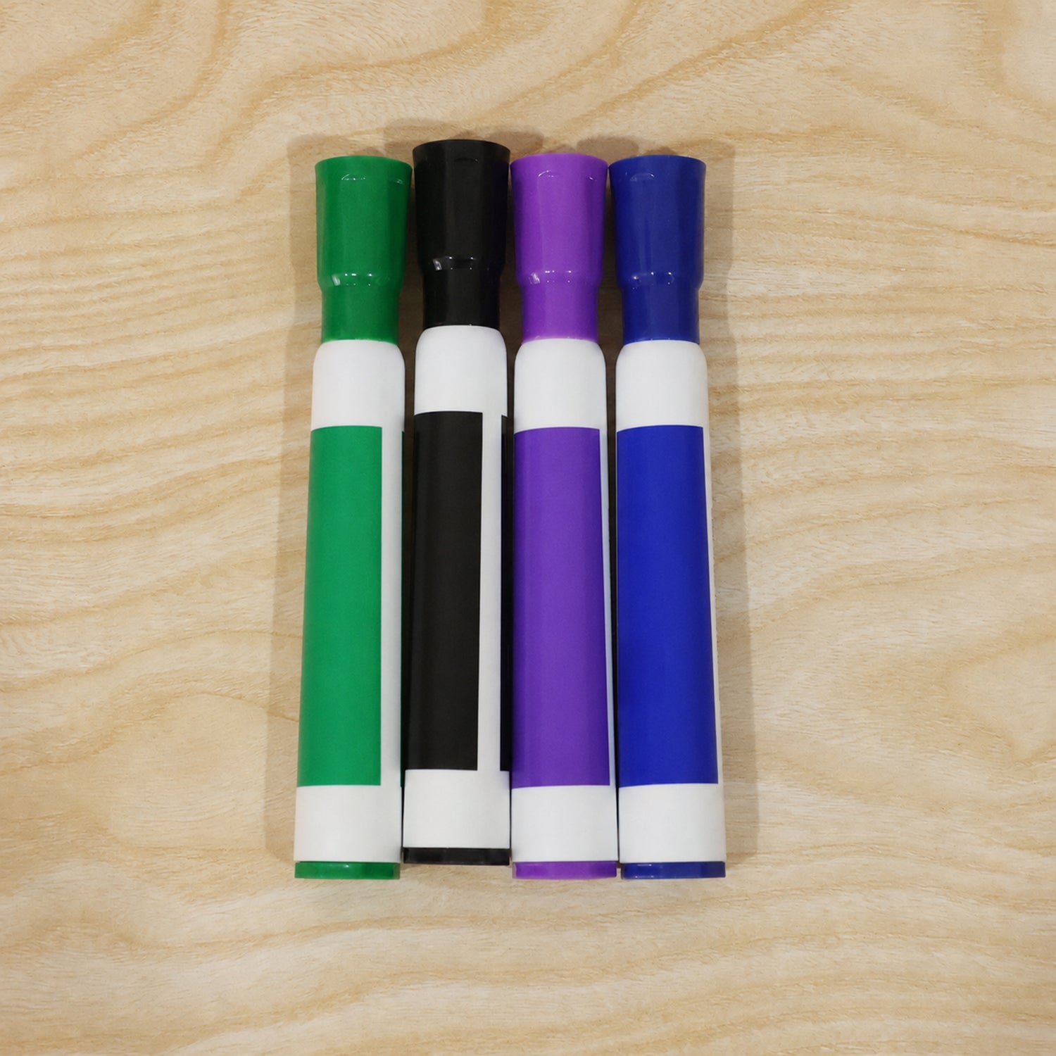 Dry erase marker in daily use within a busy classroom or office setting.
