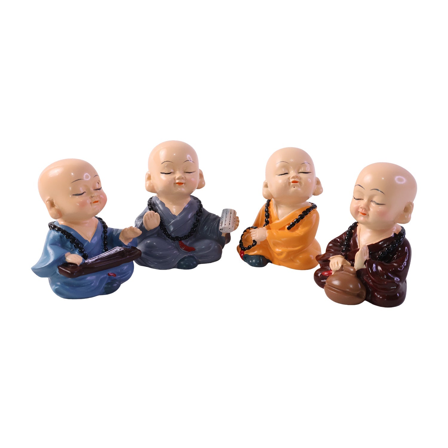 Set of four little monk statues on white background