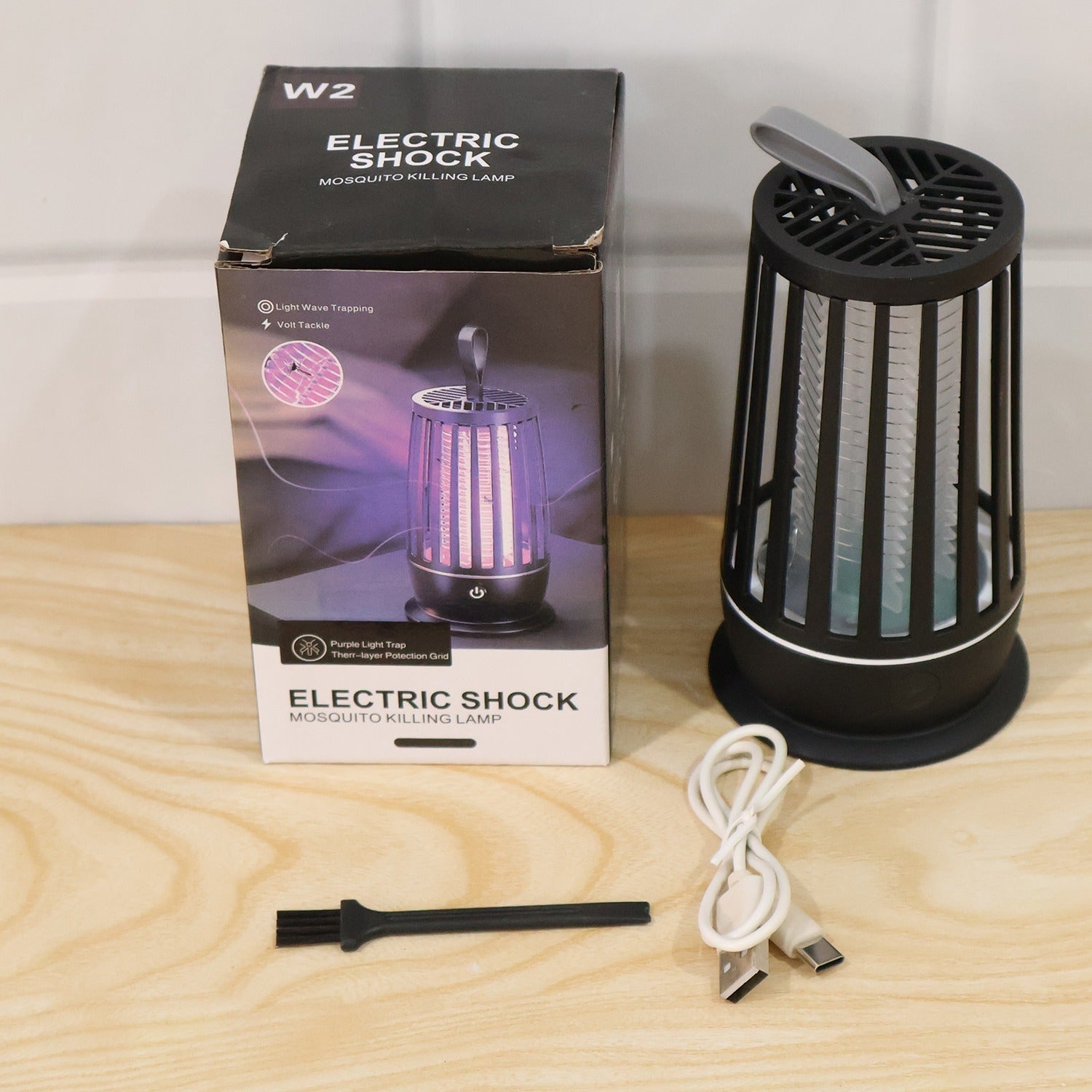 Electric shock mosquito killer lamp operating effectively in a living space.