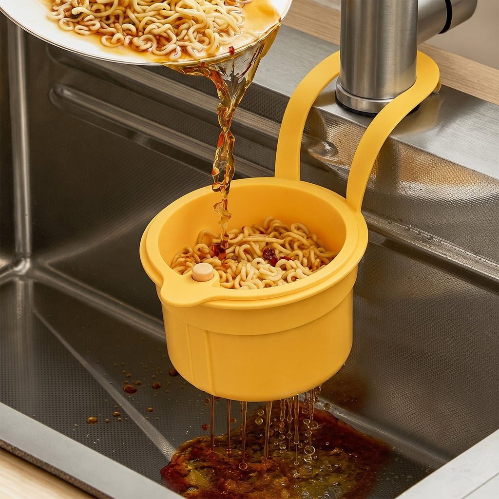 Hanging kitchen sink strainer basket draining food liquid