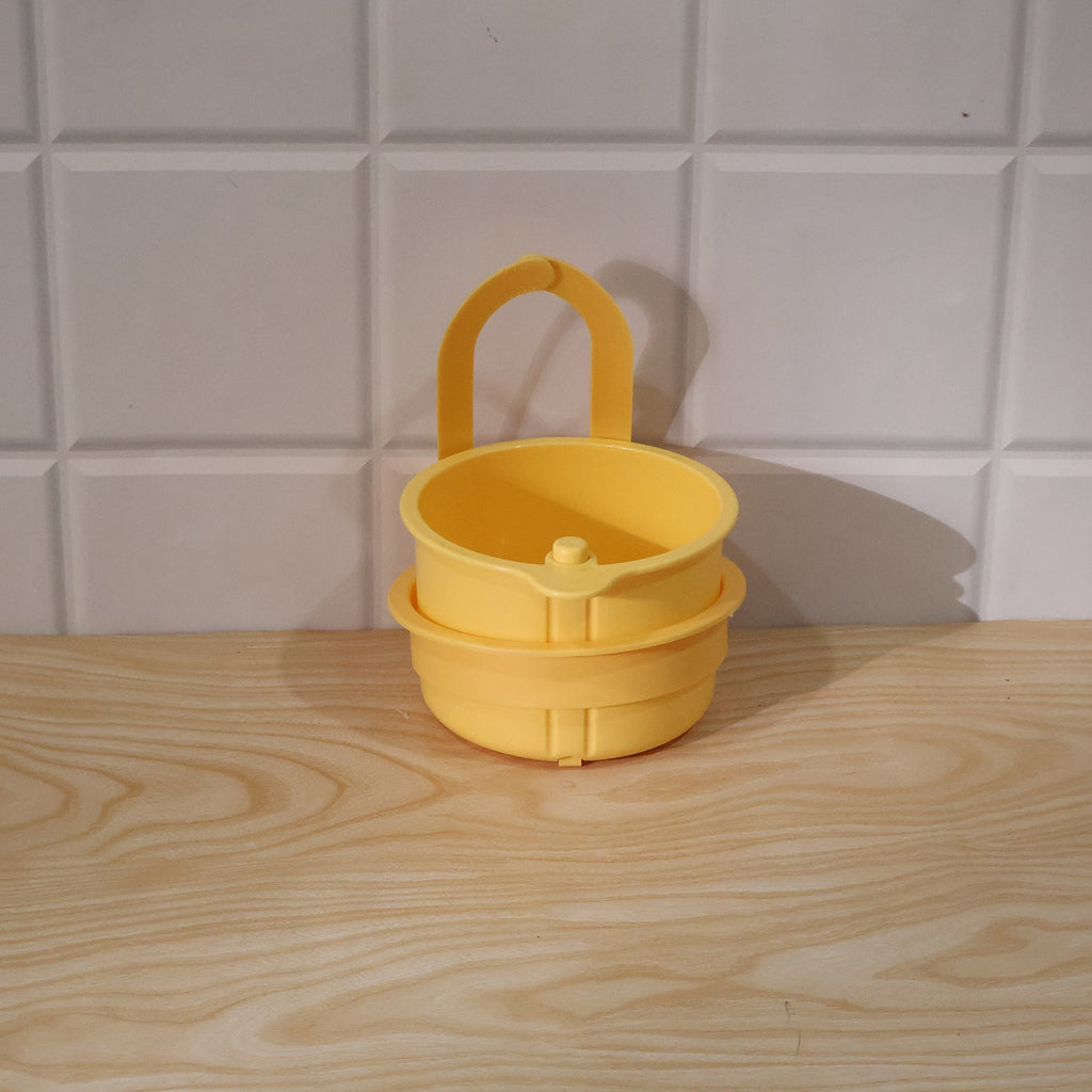 Live photo of plastic hanging kitchen sink drain basket