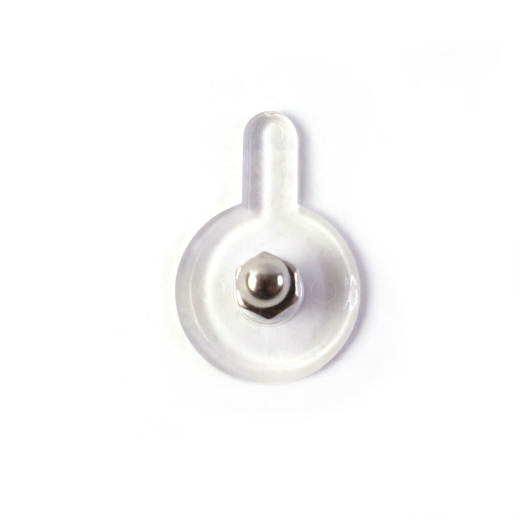 Adhesive wall hook being installed without nails