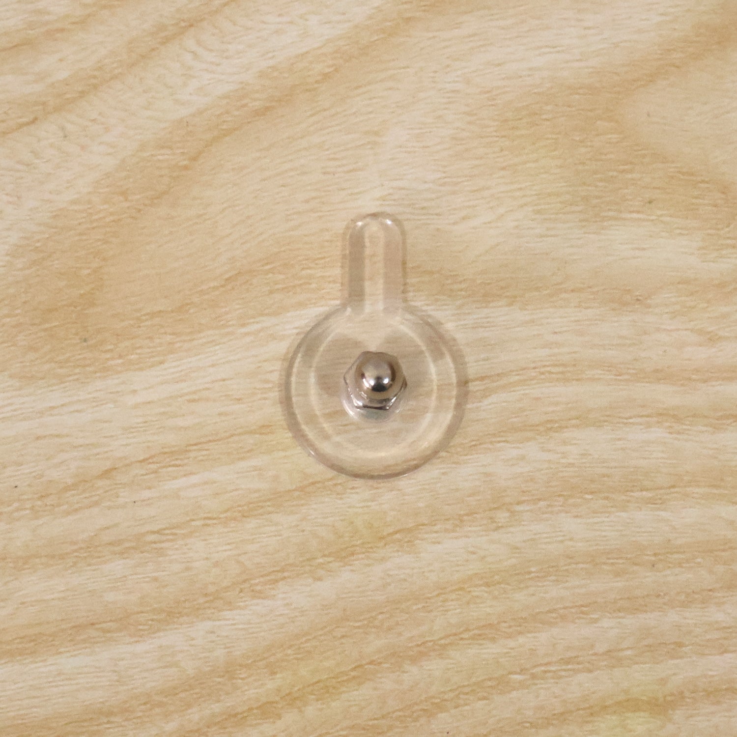 Everyday use of adhesive wall hook for home organization