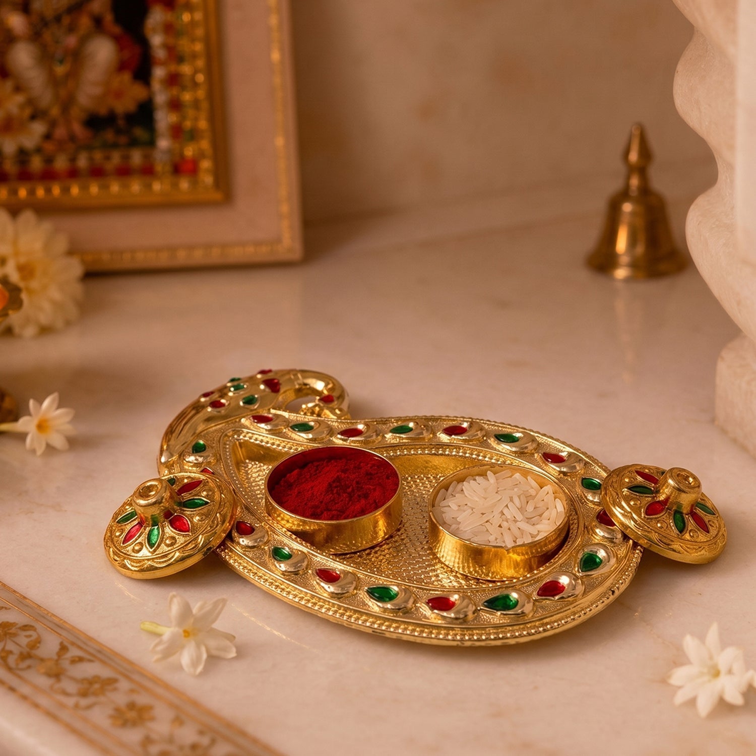 Golden Kumkum holder with intricate design on white background