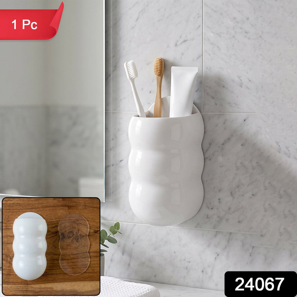 Plastic caterpillar shape wall storage holder with SKU 24067 badge