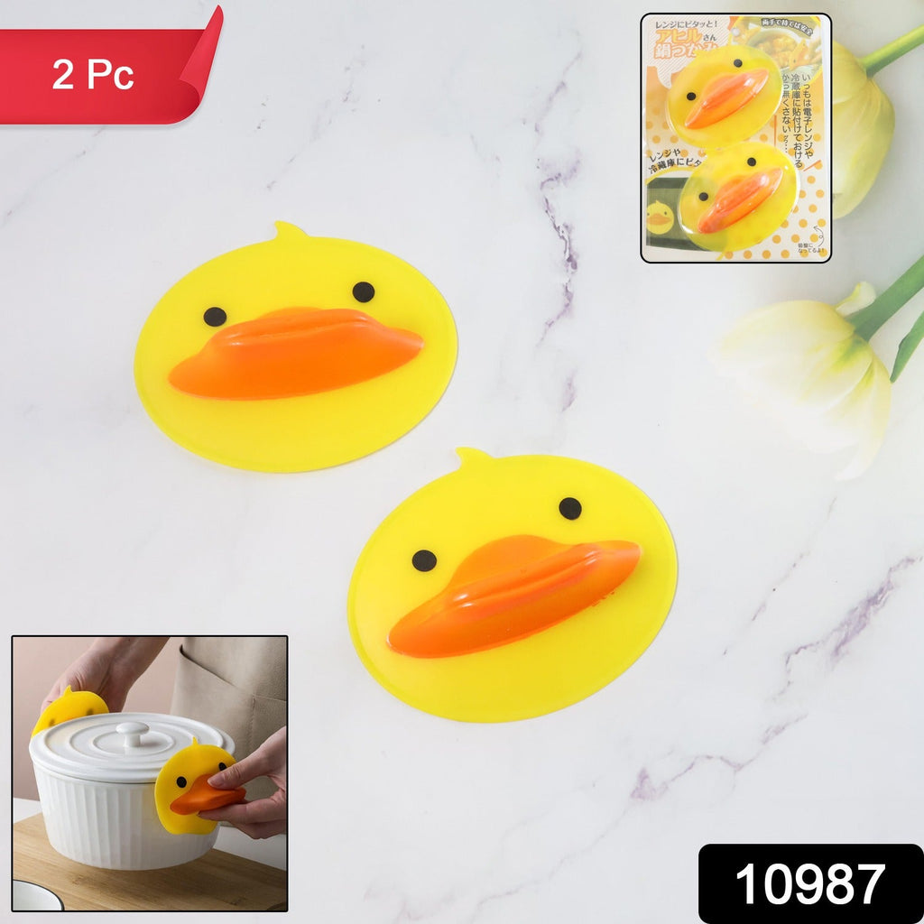Close-up of duck-shaped silicone hot pot holder with heat resistant surface