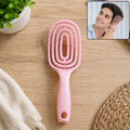Curved men's hair brush designed for detangling and styling.
