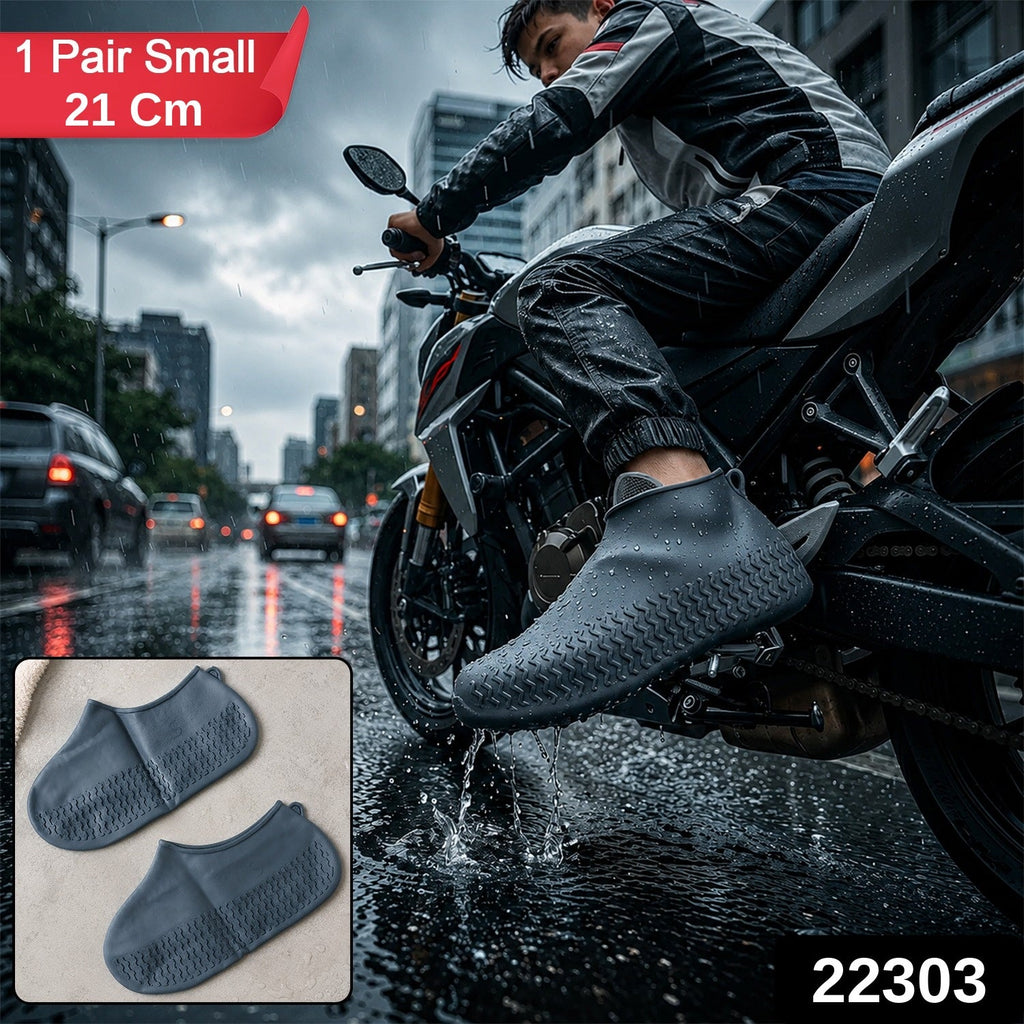 A person on a motorcycle in the rain wears a dark gray silicone shoe cover, with an inset showing a pair of the covers.