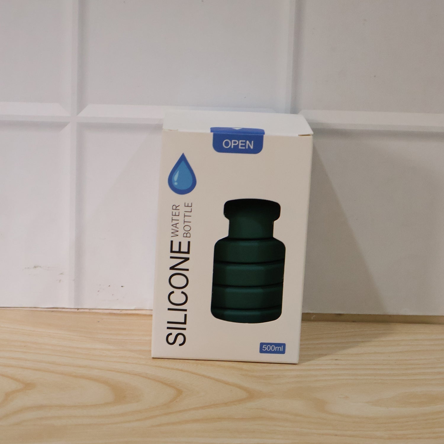 Silicone foldable water bottle in its packaging box
