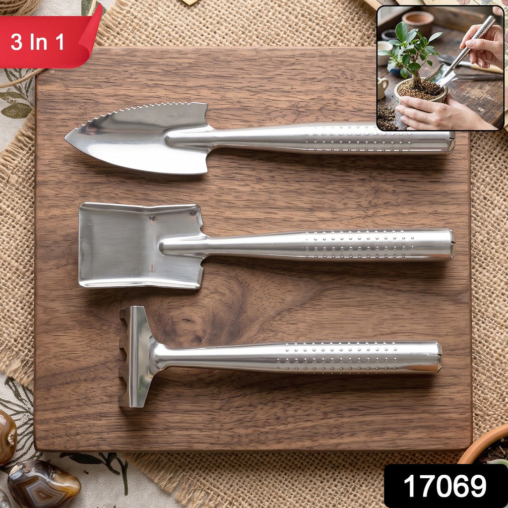 Set of 3 garden hand tools including trowel, rake and cultivator fork