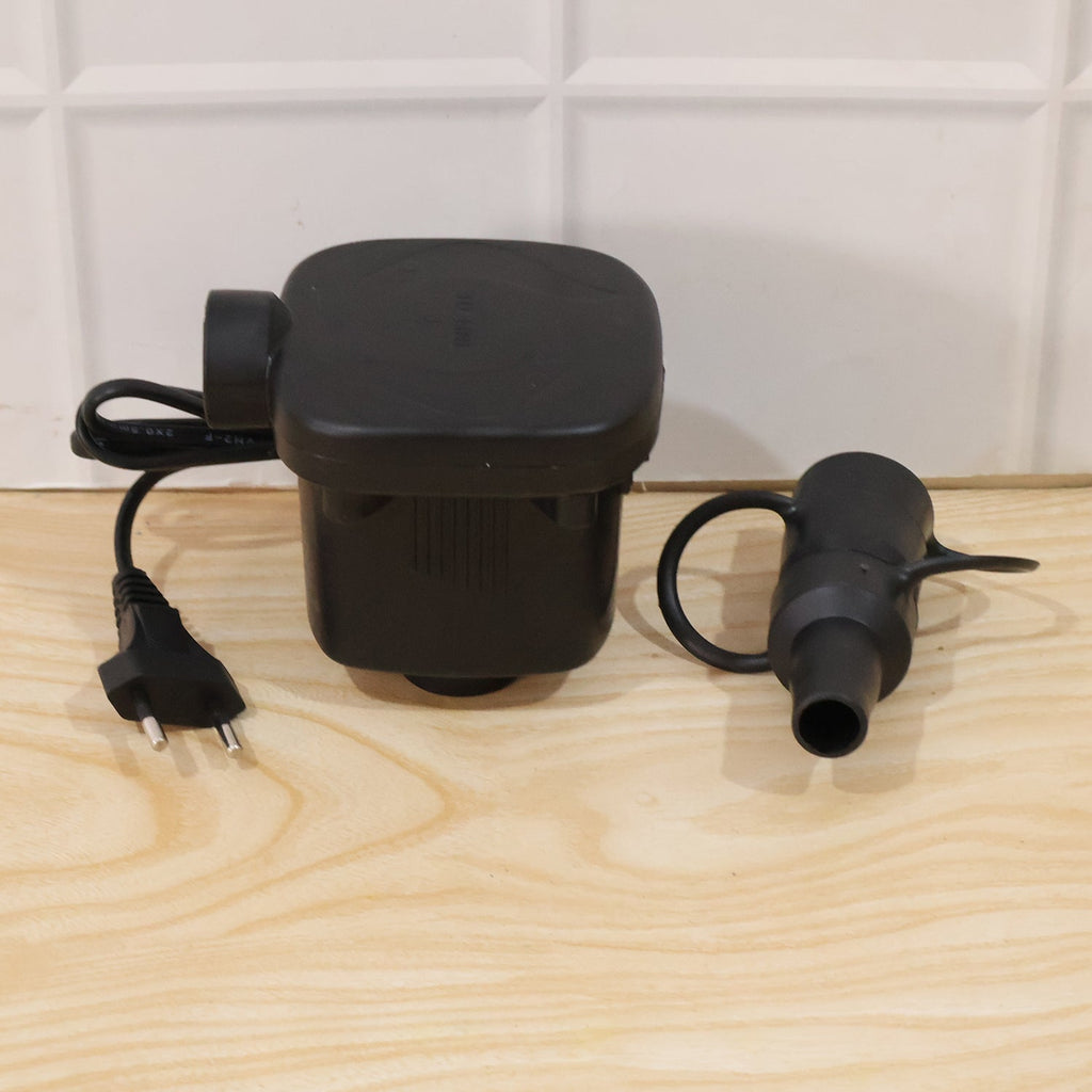 Convenient electric air pump being used for various household inflation needs.