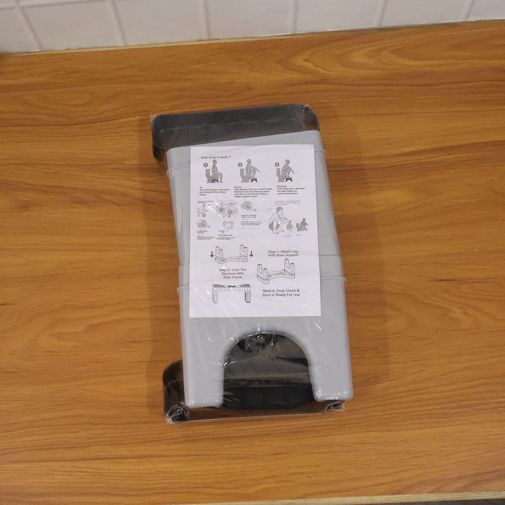 Toilet potty stool in use showing proper foot elevation and posture
