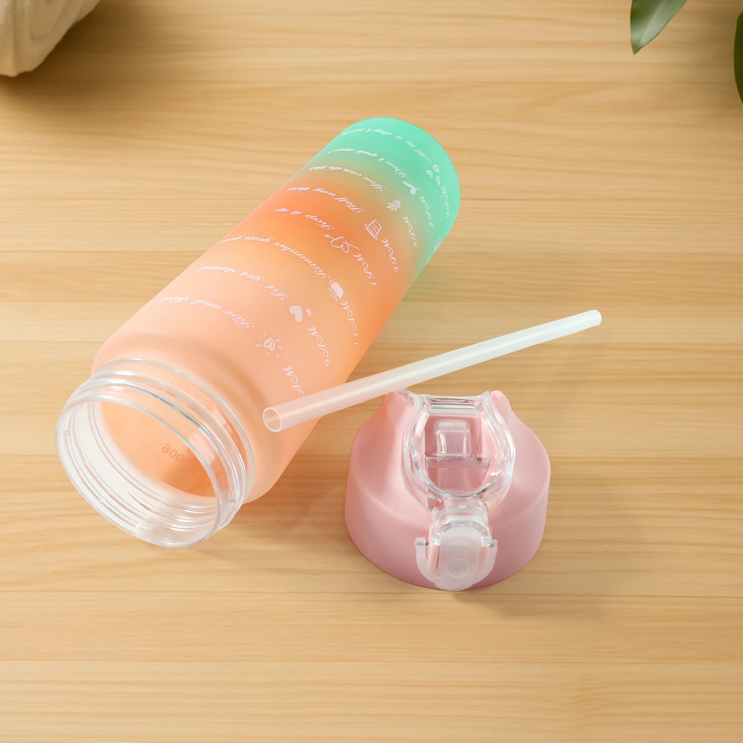 Motivational water bottle showcasing cute printed graphics and gradient finish