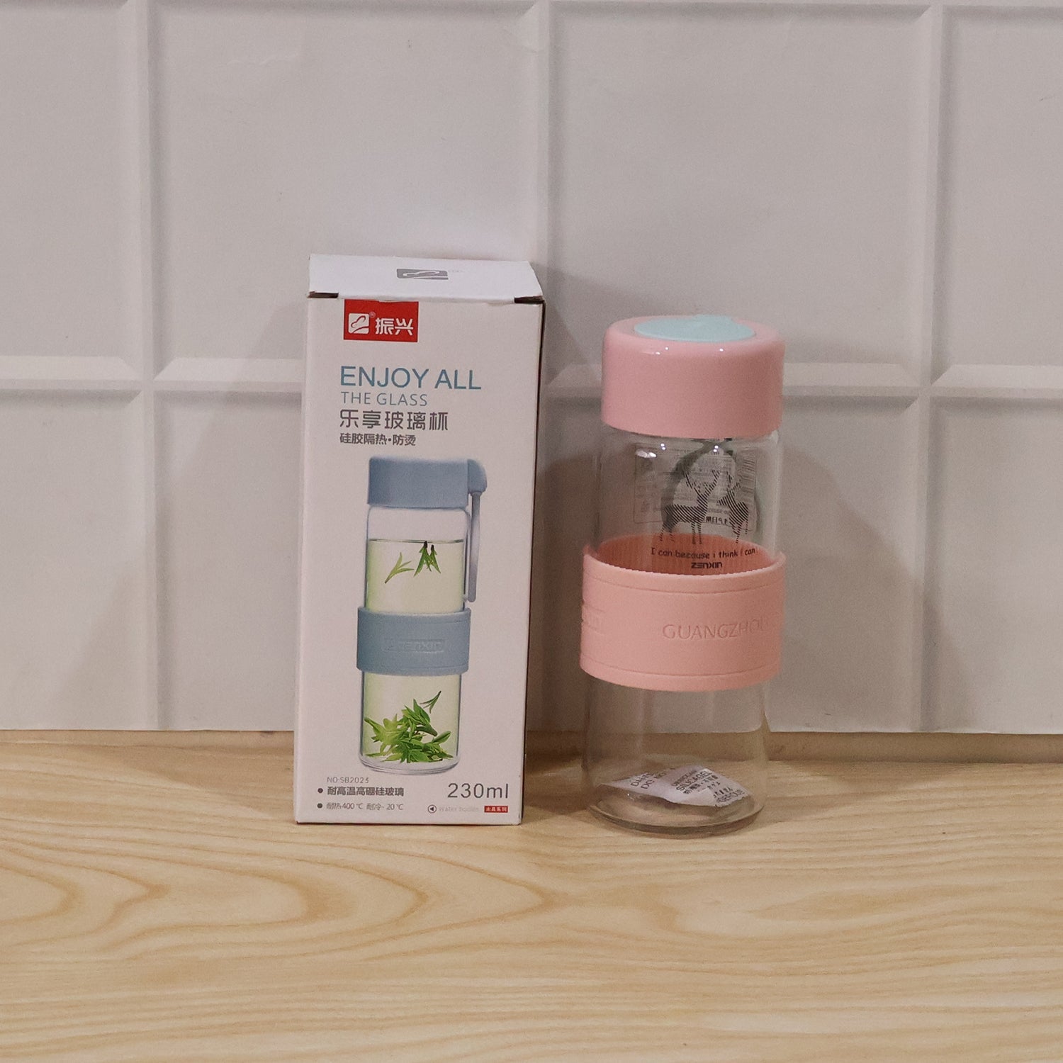 Mini 230ml glass water bottle with sleeve and strap for travel