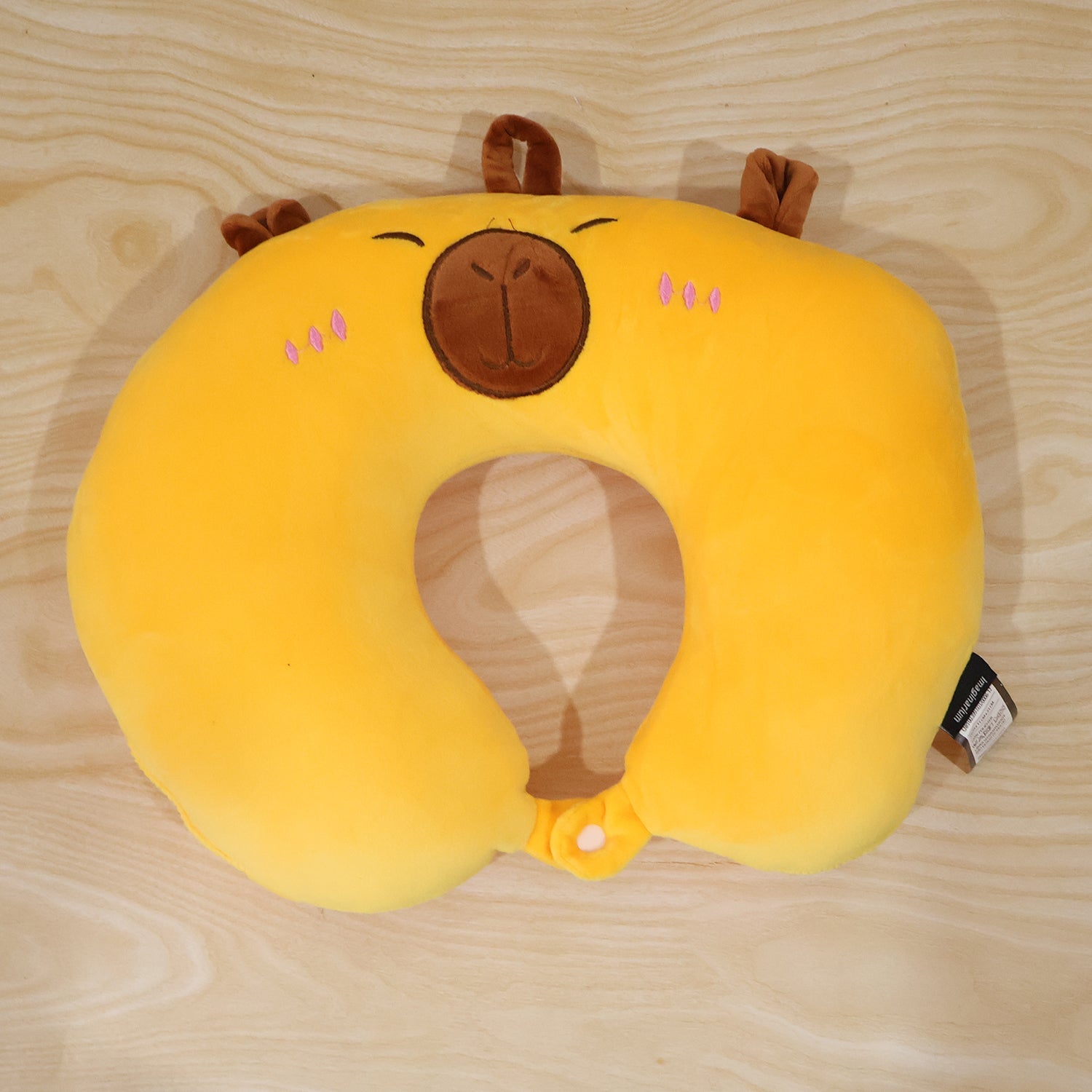 Fun capybara plush neck pillow for comfortable resting
