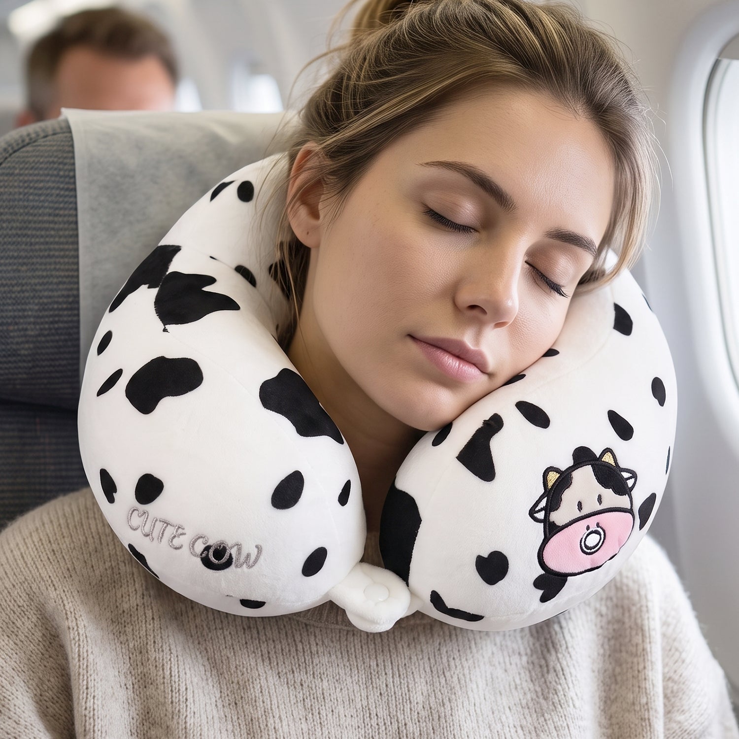 Soft cow patterned U shaped pillow for planes and cars