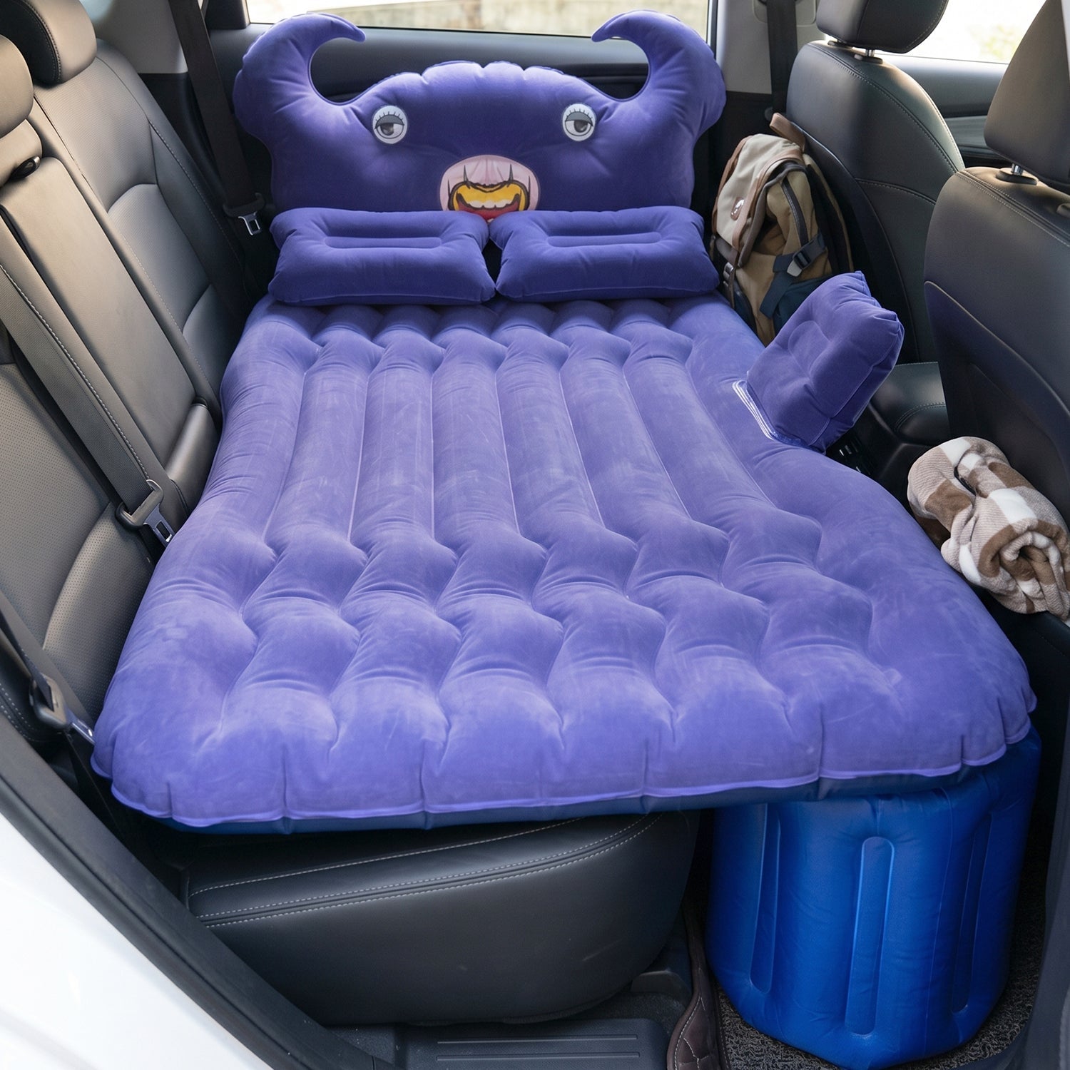 Inflatable car mattress with cushions and pump, portable design