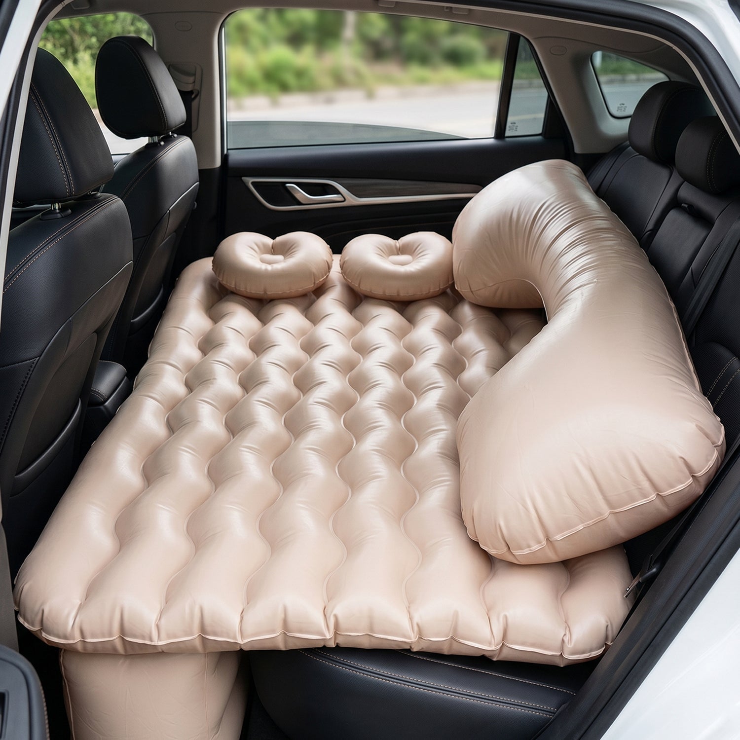 Complete car air mattress set featuring pillows and electric pump for travel.