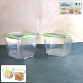 Two 500ml leak-proof food storage containers with green lids