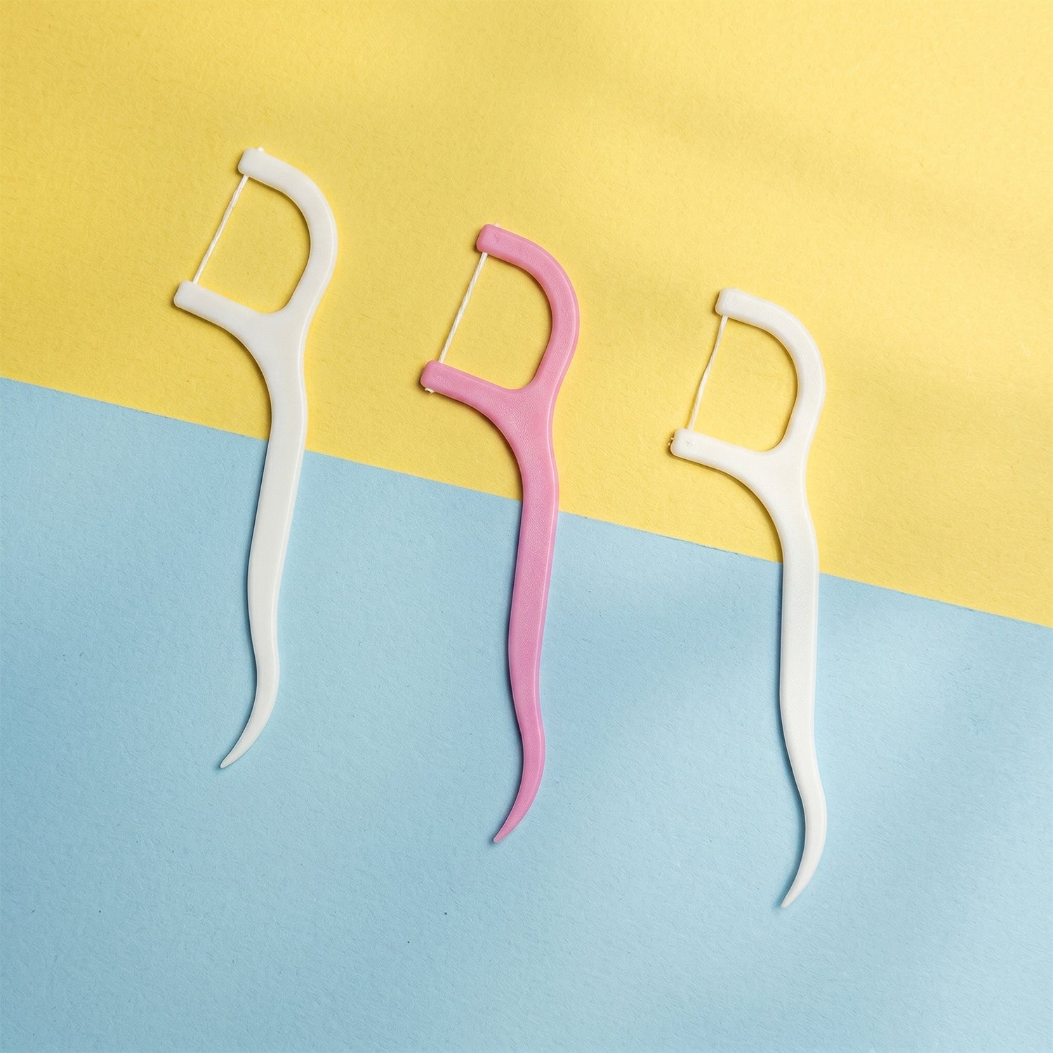 Dental floss picks white bg