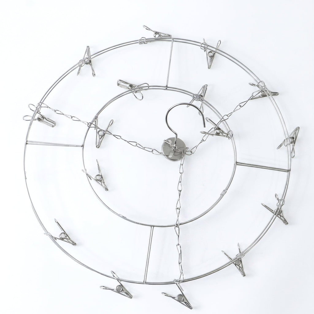 Circular drying rack with clips for socks, gloves and towels