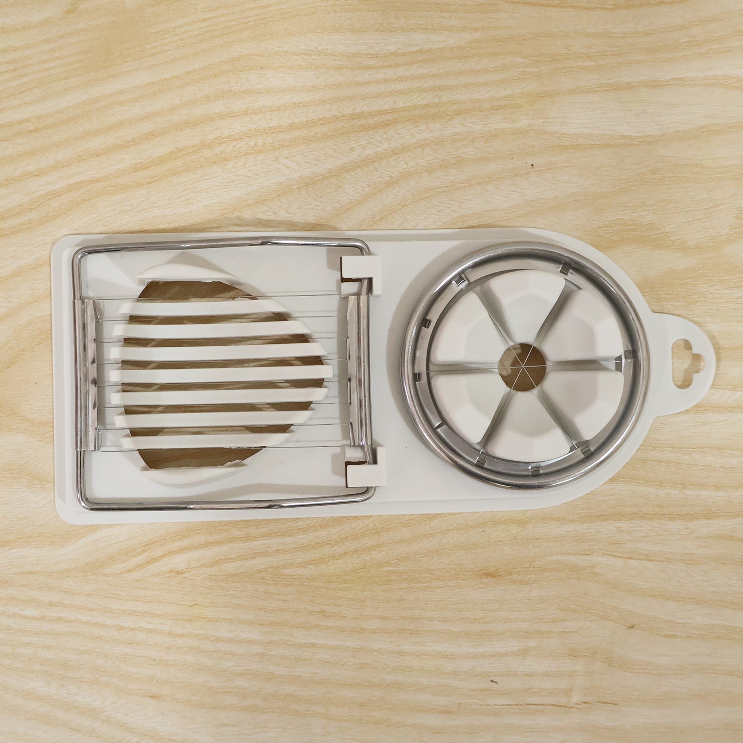 Stainless steel egg cutting tool for neat slices and wedges