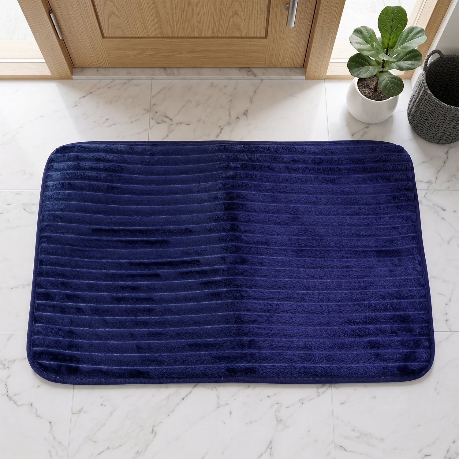 Soft absorbent carpet mat for shower and washbasin areas